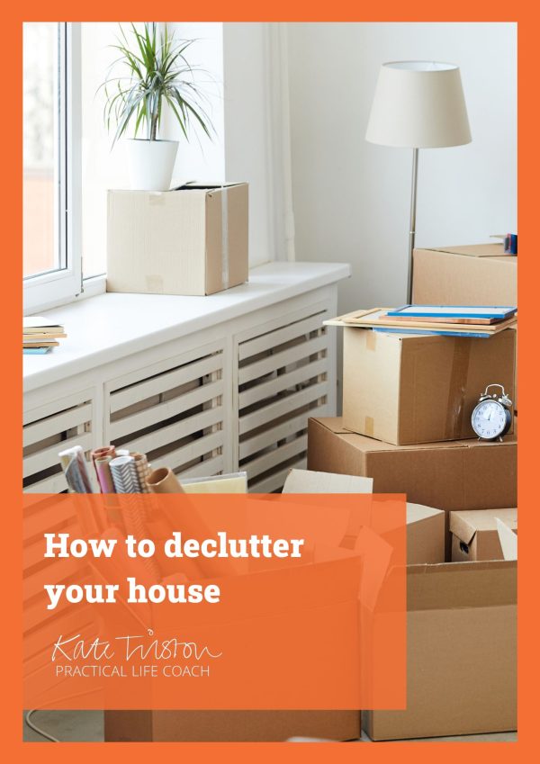 A house that has been decluttered on the cover of a how to declutter workbook